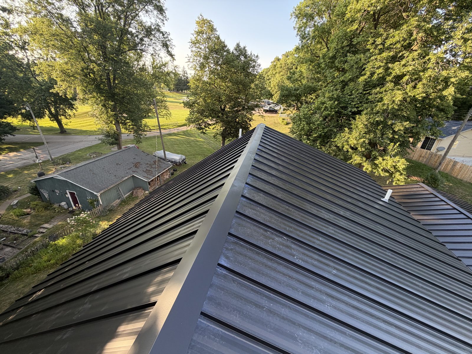 Matte black standing seam roof from above
